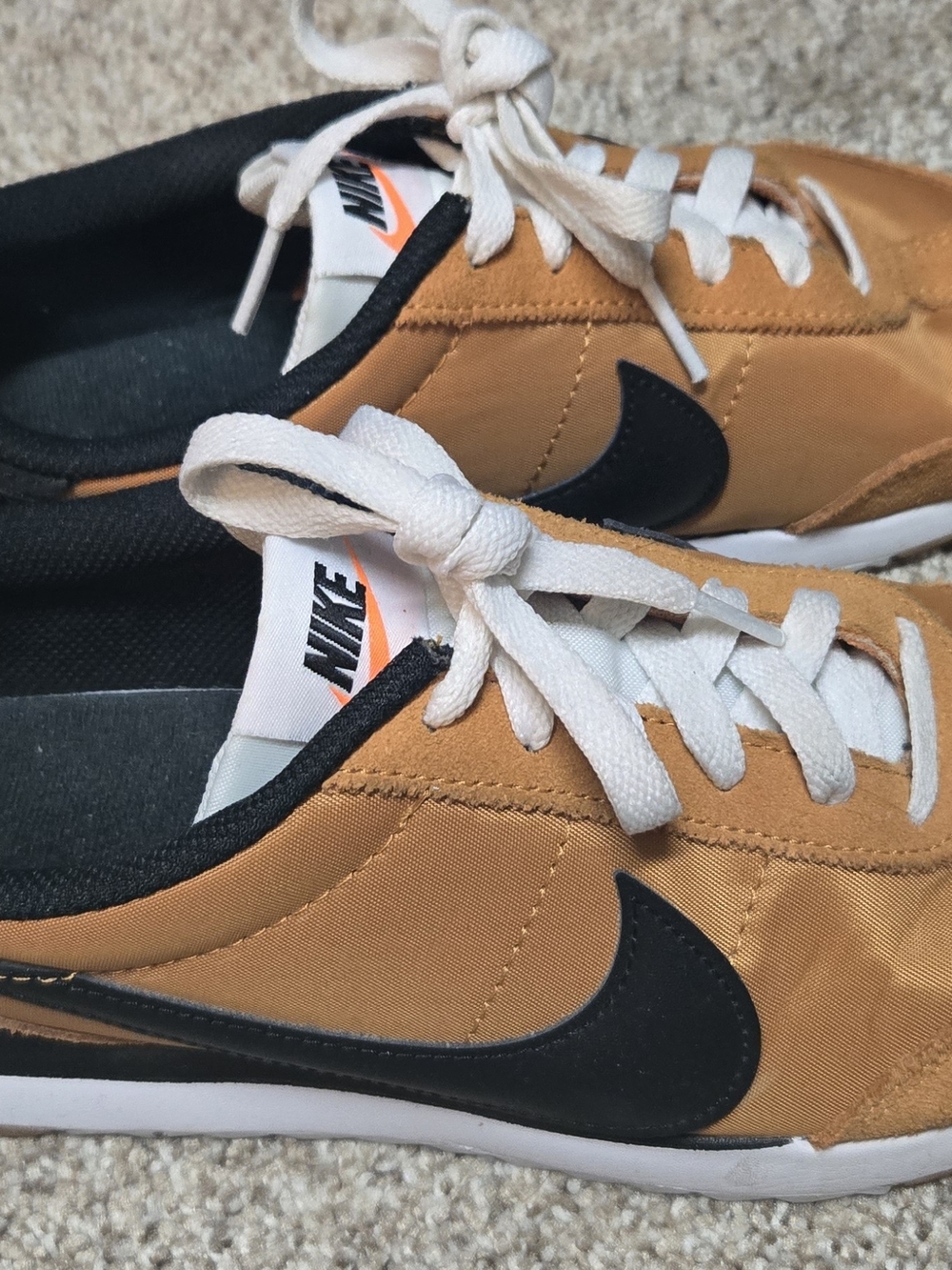 Nike Classic Low-Top Sneakers in Tan with Black Swoosh